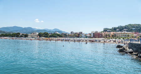The beach of Sestri Levante with blue waterの写真素材