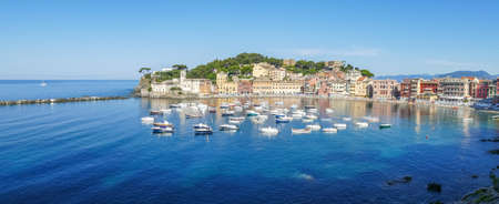 panoramic aerial view of the Bay of Silence in Sestri Levante, with many colored housesの写真素材