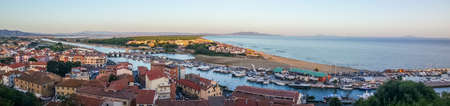ultra wide angle view of Castiglione della Pescaia at sunsetの写真素材