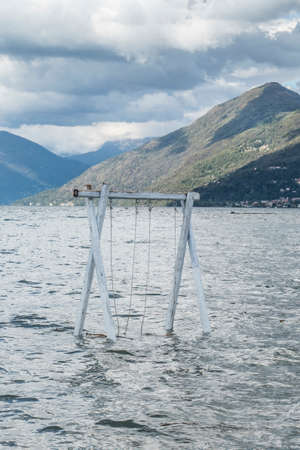 Swing submerged by Lake Maggiore in flood in Germignaga