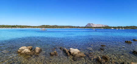 Ultra wide view of the beach of Cala Brandinchi in San Teodoroの写真素材