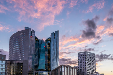 Paris, France - 09-10-2018: the skyscrapers of La Defense in Paris illuminated by the colors of a beautiful sunsetのeditorial素材