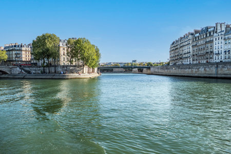 Paris, France - 09-12-2018: beautiful buildings along the banks of the seine seen from the boatのeditorial素材