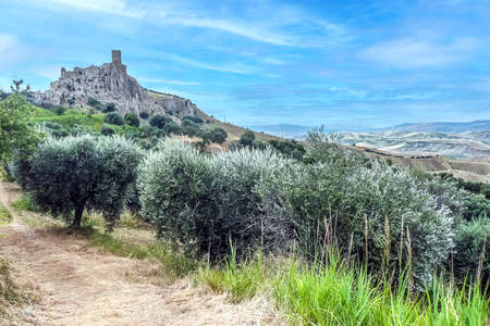 landscape of the ghost town of Craco, with abandoned houses in ruins due to a landslideの写真素材