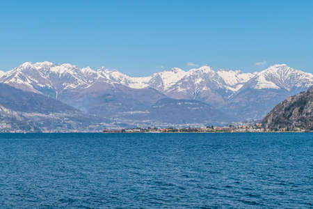 Landscape of the Lake of Coo with Dervio and the Alps in the backgroundの写真素材