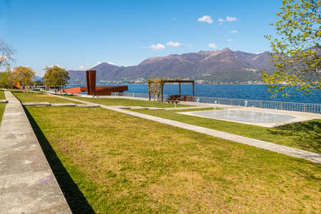 The beautiful park at the lake of Luino with the fountainsの写真素材