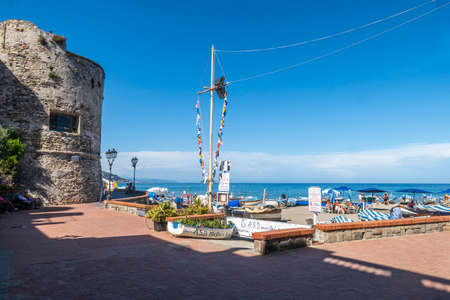 Laigueglia, Italy - 07-02-2021: beautiful ancient tower on the promenade of Laiguegliaのeditorial素材