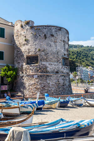 Laigueglia, Italy - 07-02-2021: beautiful ancient tower on the promenade of Laiguegliaのeditorial素材