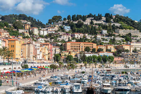 Menton, France - 07-07-2021: The historic center of Menton with the beautiful Basilica and colorful housesのeditorial素材