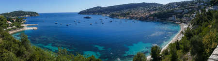 Extra wide Aerial view of the beautiful beaches and the fantastic sea of Villefranche-sur-Merの写真素材