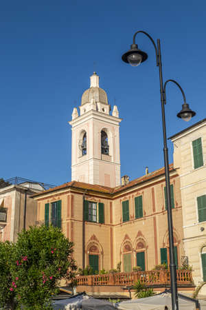 Noli, Italy - 07-07-2021: houses with beautiful facades and bell tower in Noliのeditorial素材