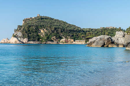 The beautiful beach of Malpasso in Varigotti with transparent and turquoise waterの写真素材