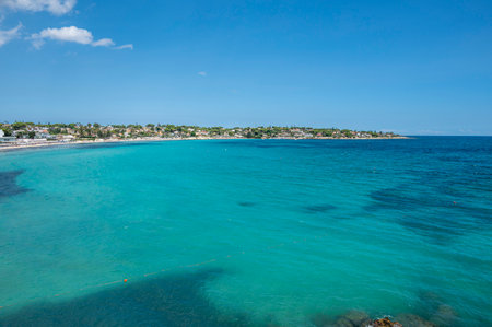 Landscape of a beautiful beach with clear and crystalline turquoise water and fine sand in Sicily in Syracuse called Fontane Biancheの写真素材