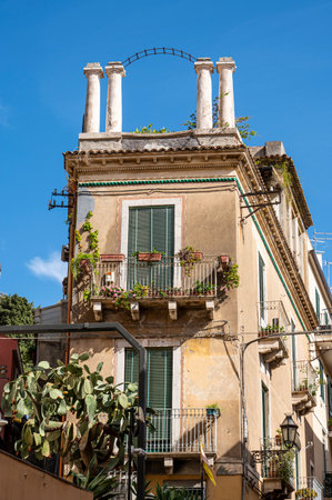 Taormina, Italy: 09-16-2022: beautiful building with greek columns in Taorminaのeditorial素材