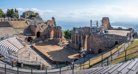 Taormina, Italy: 09-16-2022: Extra wide angle view of the famous Greek theater of Taorminaのeditorial素材