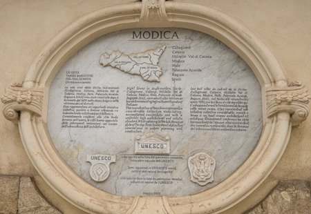 Modica, Italy: 09-21-2022: Descriptive marble plaque of Modica and other Baroque cities in Sicilyのeditorial素材