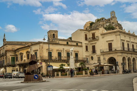 Modica, Italy: 09-21-2022: Beautiful square in Modica with the castle in the backgroundのeditorial素材