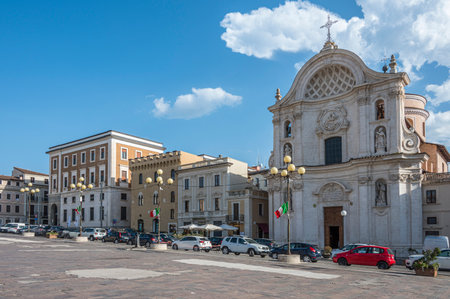 L'Aquila, Italy - 07-07-2022: The beautiful Piazza Duomo in L'Aquila with historic buildings and churchesのeditorial素材