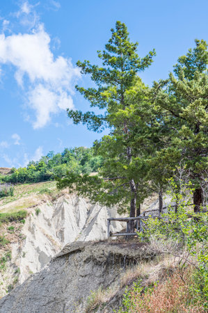 lookout over the badlands of Atri with its stupendous and amazing clayey formationsの写真素材