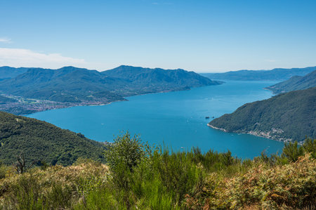 Aerial view of the Lake Maggiore with blue sky from a mountainの写真素材