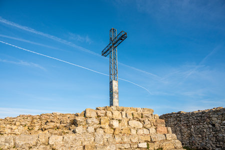 The metal cross on the Rocca di Manerba sul Gardaの写真素材