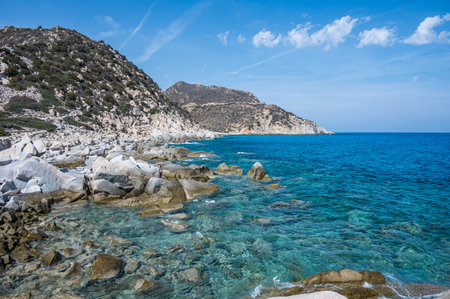 The beautiful beach of Punta Molentis in Villasimius with white sand and turquoise waterの写真素材