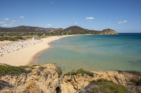 Pula, Italy - 09-10-2024: Beautiful beach in Chia, in Southern Sardinia, with white sand and transparent and turquoise waterの写真素材