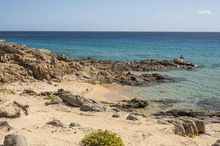 Beautiful beach in Chia, in Southern Sardinia, with white sand and transparent and turquoise waterの写真素材