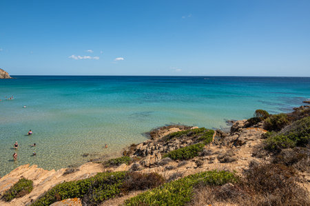 Beautiful beach in Chia, in Southern Sardinia, with white sand and turquoise waterの写真素材