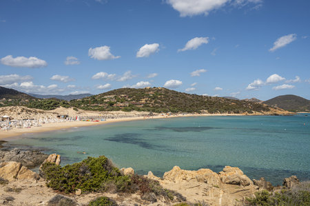 Pula, Italy - 09-10-2024: Beautiful beach in Chia, in Southern Sardinia, with white sand and transparent and turquoise waterの写真素材