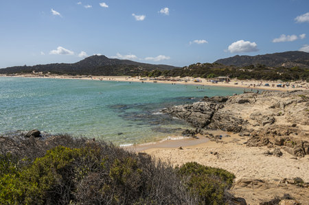 Beautiful beach in Chia, in Southern Sardinia, with white sand and transparent and turquoise waterの写真素材