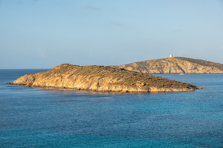 Aerial view of a bay with the beach of fine sand and transparent blue and turquoise waterの写真素材