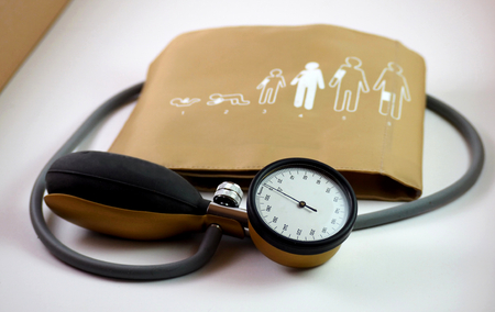 Blood pressure meter, or sphygmometer, with the band in which they are imprinted with the...