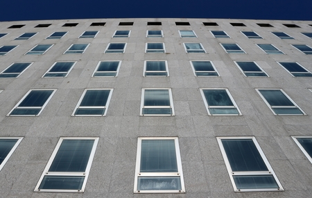 Gray stone facade of a buildingの写真素材