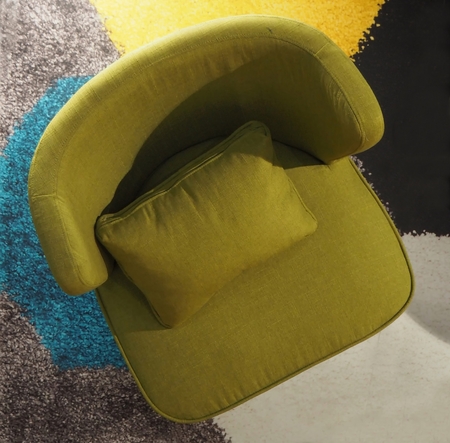 Top view of an olive tree on a colorful carpet, Sofa close upの写真素材