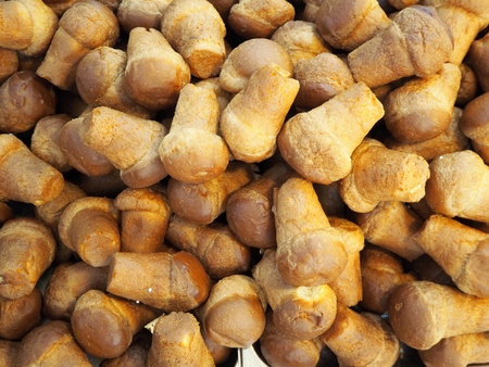 Large heap of Baba, the famous italian sweet of Naples. Food background and texture.