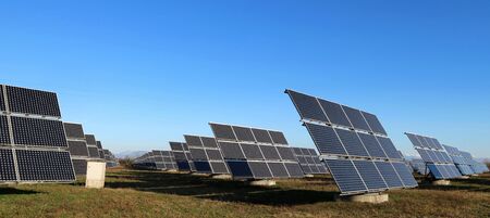 Large solar panels field in a winter cloudless sunny day.の写真素材