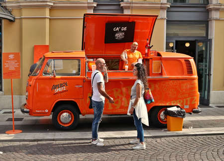Gorizia, Italy. September 27, 2019. Iconic Volkswagen T2 truck used as Aperol Spritz pop-up bar on the city street.のeditorial素材