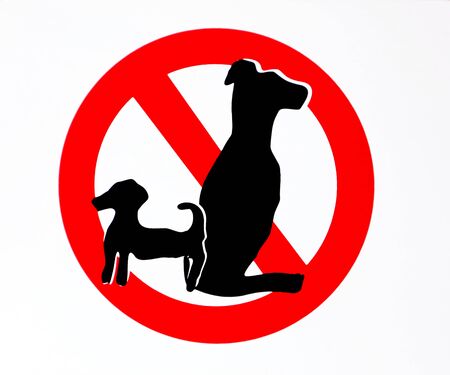 No dogs allowed sign with the silhouettes of two animals, one small and one large.の写真素材