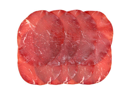 Slices of Bresaola, traditional air dried salted beef cold meat from North Italy, on white background.の写真素材