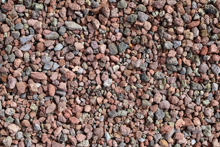 Multicolor decorative pebbles used in the garden, flower beds or yard. Backgrounds and texturesの写真素材