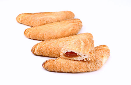Sfogliatine Fiorentine, a typical sweet of the city of Fiorenze, made of puff pastry stuffed with jam. White background.の写真素材