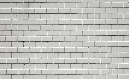 Pearl gray painted brick wall. Backgrounds and textures. Copy space.の写真素材