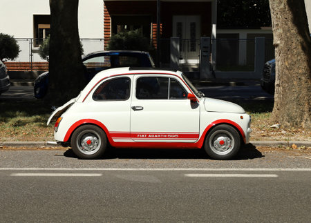 Udine, Italy. June 26, 2021. Fiat 595 Abarth, version of the classic Fiat 500 in the Sixties with the brand and model name written on its side, in an urban streetのeditorial素材