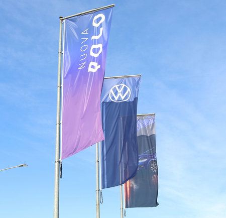Udine, Italy. January, 2 2021. Advertising banners outside the official dealer of Volkswagen for the new Polo car model.のeditorial素材