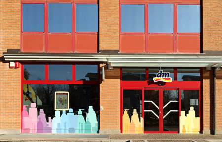 Udine, Italy. January 6, 2022. . Entrance and multicolored window of DM store, Drogerie Markt. It is a German shop chain selling cosmetics, household products, healthcare items andのeditorial素材