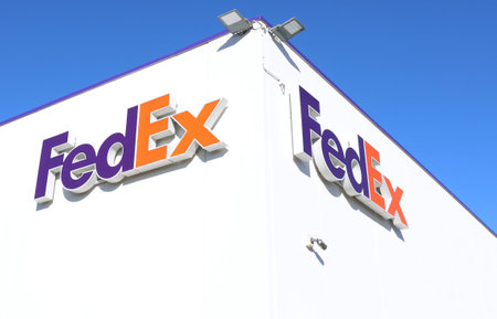 Udine, Italy. January 15, 2022. FedEx logo outside the local branch. It is an American multinational company operating on transportation, e-commerce and services.のeditorial素材