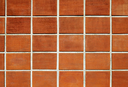 Terracotta tiled wall. Backgrounds and textures. Full-frame.の写真素材