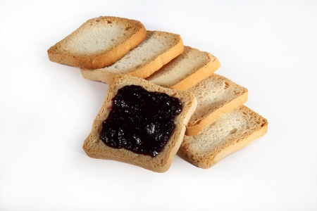 group biscuits with jam on white backgroundの写真素材