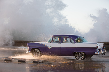 Old american Car on the malecom Havana Cubaのeditorial素材